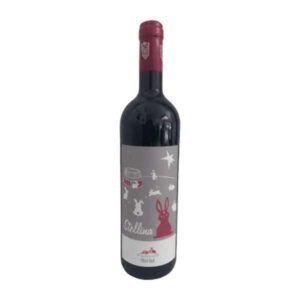 Bottle of Stellina Merlot red wine with a gray label featuring a pink rabbit and stars.