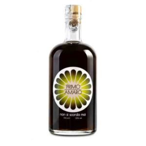 Bottle of Primo Amaro liqueur with a circular green-yellow label, cork stopper, dark glass, and the text 'PRIMO AMARO' on the label