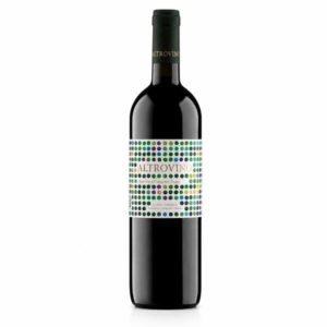 Bottle of Altrovino red wine (Merlot & Cabernet Franc) with a multicolored dotted label, Costa Toscana, standing on a white background.